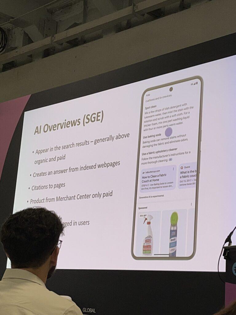 Smartphone displaying Google's new AI-generated search overview, launched May 2024, reshaping SEO strategies.