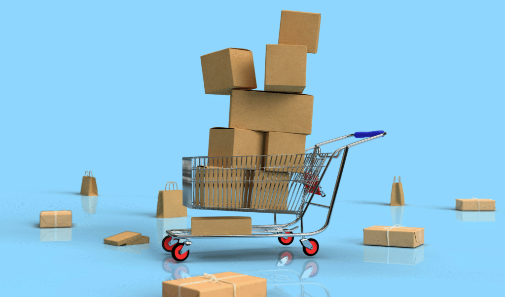 Shopping cart with industrial packages representing manufacturing e-commerce transformation and digital commerce solutions
