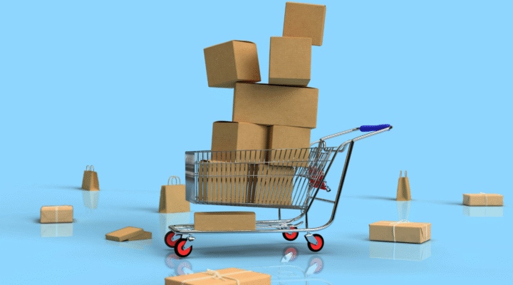 Shopping cart with industrial packages representing manufacturing e-commerce transformation and digital commerce solutions