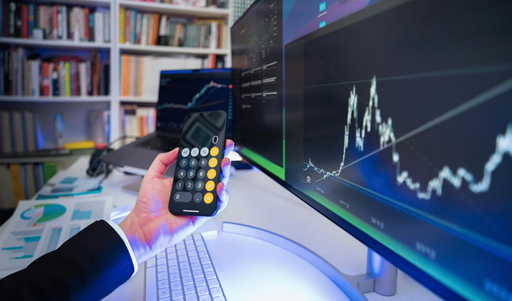 computer and mobile screen showing automotive industry AI forecasting solutions