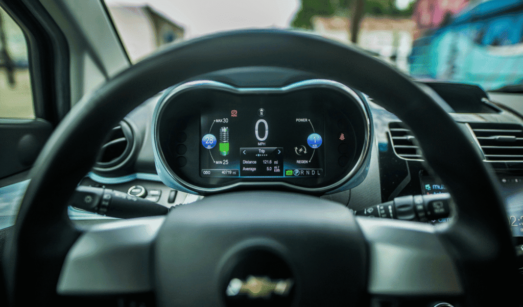 Modern car digital dashboard displaying data metrics for automotive business intelligence